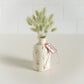 Bunny tails in hand painted vase