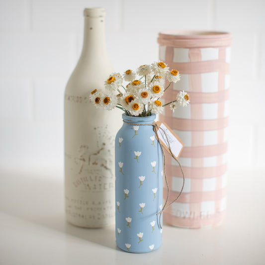 Everlasting Daisies in Blue Vase